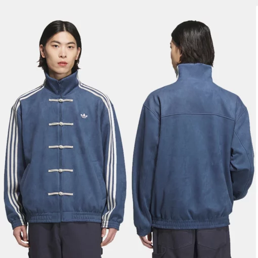 Blue Adidas Tang suede jacket with toggle closure, stand-up collar, and stripes running from collar to sleeve hem.