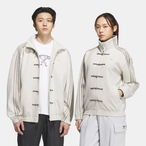 White Adidas Tang suede jacket with toggle closure, stand-up collar, and stripes extending from collar to sleeve hem.