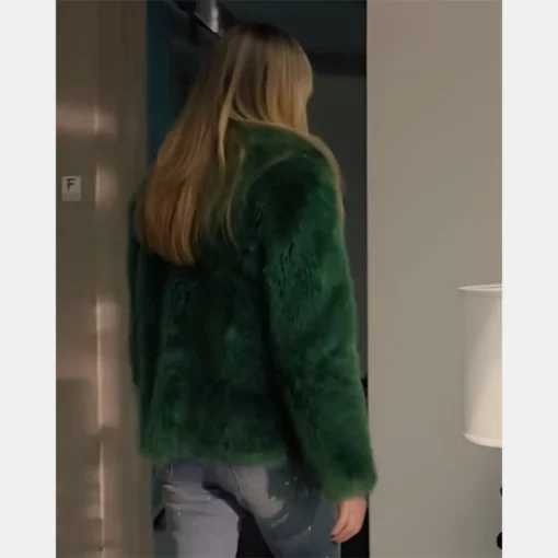 Kaitlin Olson’s High Potential green coat with a plush fur texture.
