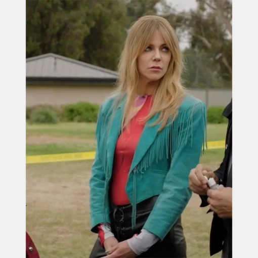 Fashion-forward teal fringe jacket from High Potential, worn by Morgan Gillory.