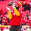 Chiefs Nike fleece hoodie with bold red and yellow team colors for fans.