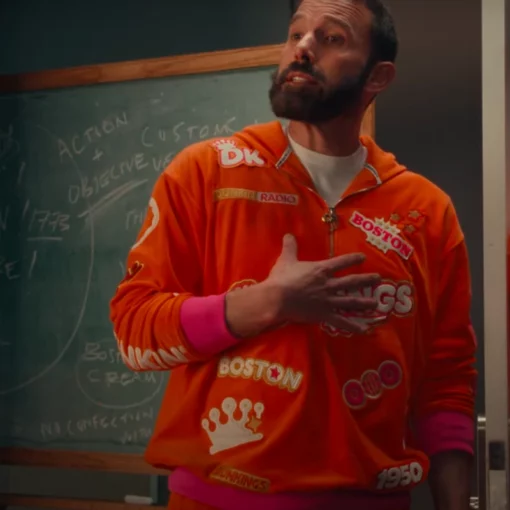 Dunkin’ Donuts DunKings tracksuit with an all-over print of coffee-related imagery, donut patterns, and signature branding