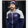 Close-up of the Columbus Blue Jackets logo on the navy and gray fleece hoodie.