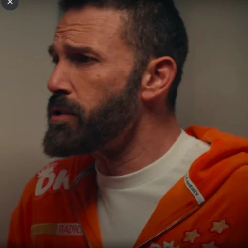 Standout Ben Affleck Super Bowl LIX tracksuit, featuring a Dunkin’ Donuts-inspired design filled with colorful brand graphics