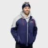 Front view of the Columbus Blue Jackets Navy Gray 2025 Stadium Series Full-Zip Hoodie featuring team graphics.