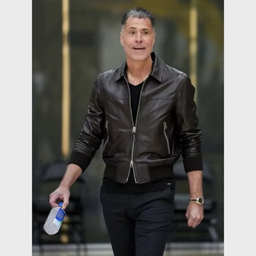 Classic black leather bomber jacket with a structured design and ribbed cuffs