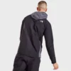 Back view of The North Face performance jacket highlighting its athletic fit