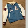 Vintage varsity jacket in blue and white, exuding 90s hip-hop fashion.