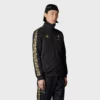 Lightweight and stylish black track top jacket with Mexico-themed graphic detailing.