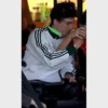 Timothée Chalamet’s Adidas Saint-Etienne track jacket, showcasing classic white stripes on the sleeves.