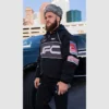 Sporty black UFC jacket with a full-zip closure and subtle branding.