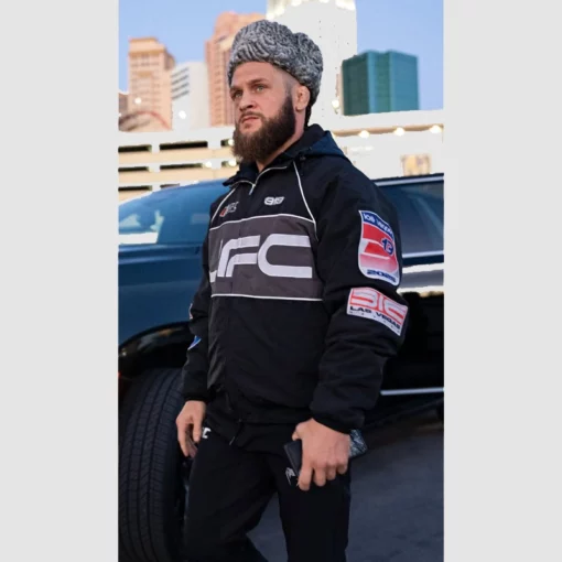 Sporty black UFC jacket with a full-zip closure and subtle branding.