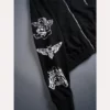 Darc Sport Wolves On Our Sleeve black zip hoodie featuring bold sleeve graphics.