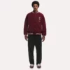 Sporty and fashionable maroon jacket designed for FC Bayern fans.
