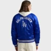 Statement blue satin varsity jacket with LA Dodgers and MLB Tokyo branding.