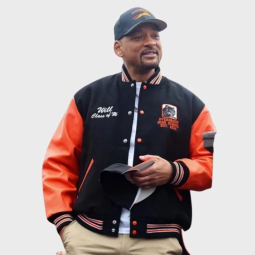Black and orange varsity jacket worn at the Will Smith Way street renaming event.