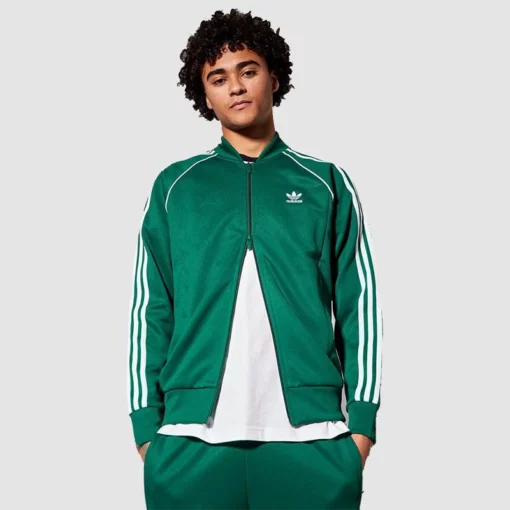 Sporty SST Adidas jacket in standout green shade.