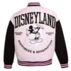 Classic Mickey Mouse pink varsity jacket with striped trims.