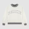 nside-out style mockneck offering a raw, contemporary look.