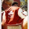 Cactus Jack x State Farm jacket with bold varsity aesthetic.