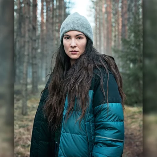 Blue puffer jacket styled after Léonie Vincent in The Glass Dome 2025.