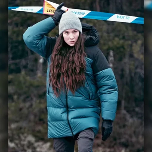Léonie Vincent blue puffer jacket from The Glass Dome 2025.
