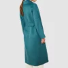 Teal trench coat worn by Anna Kendrick in Another Simple Favor