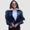 Eiza González shearling-trimmed black jacket in 2025 film