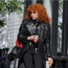 Charlie Cale black coat from Poker Face S02 worn by Lyonne