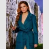 Stephanie Smothers teal outerwear in 2025 film
