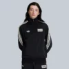 Side angle showcasing signature stripes on Adidas x Oasis Black Track Jacket