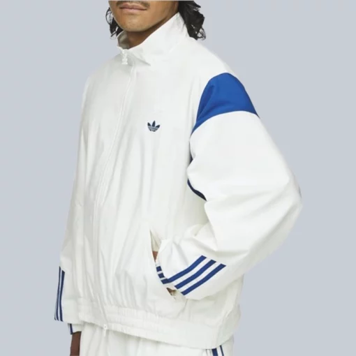 Unisex Adidas track jacket in crisp white poplin with co-branded Chavarria details.