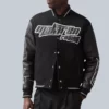 F1 Team Circuit black bomber jacket featuring Reiss tailoring and McLaren branding.
